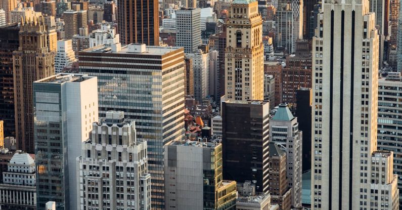 Latin America Property - From above of downtown of megapolis with high rise financial and residential buildings located in New York City in daytime