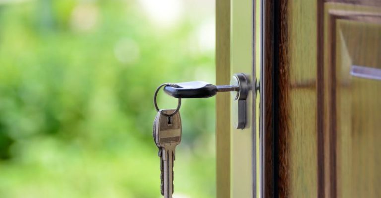Open House - Black Handled Key on Key Hole