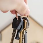 Financing Offer - Person with keys for real estate