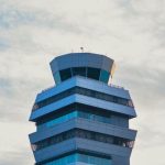 Rent Control - An airport control tower with a blue sky in the background