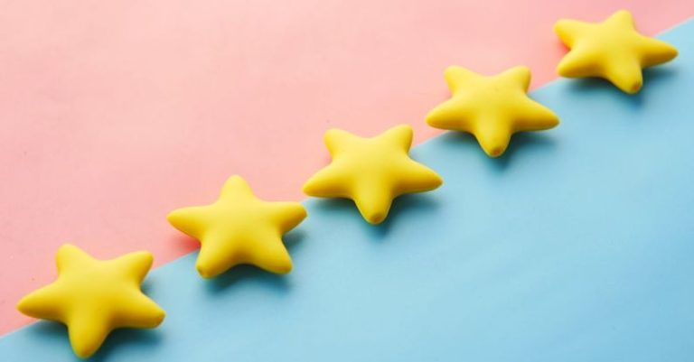 Reviews Ratings - Five Yellow Stars on Blue and Pink Background